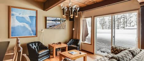 Cozy living area with TV and glass doors