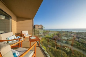 Breathtaking ocean views from private balcony off living room.