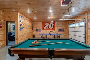 Large game room with pool and ping pong table and Corn hole game