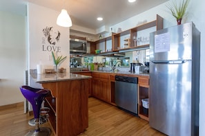 Full layout of the kitchen area with mini dinning 