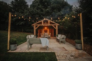 Shared use of outdoor BBQ/timber gazebo & open log fire