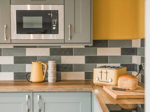 Kitchen area | Swallow Lodge - Merbach Hill View Holidays, Clifford