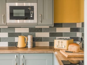Kitchen area | Swallow Lodge - Merbach Hill View Holidays, Clifford
