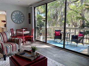 Living area with sliders to the deck