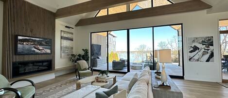 Gorgeous Modern Living Room w/ 20' vaulted celing, Gas Fireplace, Comfy Seating & Unbelievable View