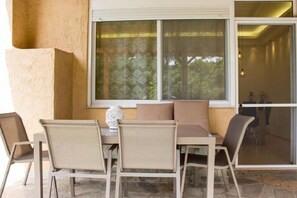 Outside dining area in Physis rental estate