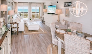 Open floor plan with the focus being the view of the white sand & emerald water!