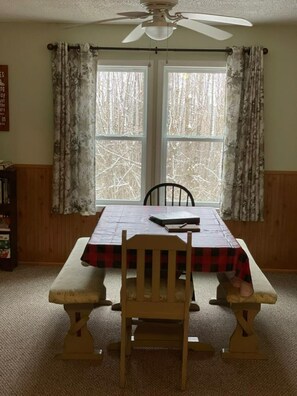 Step into our sleek dining area, featuring clean lines and minimalist design.