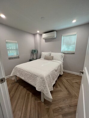 Bedroom with split-type AC.