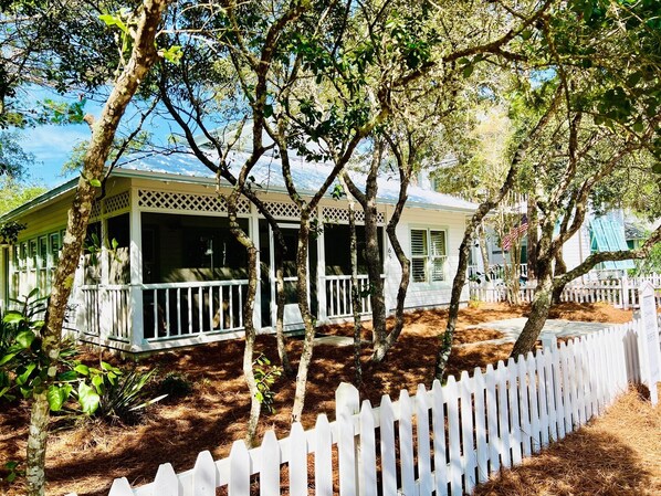 Front of cottage, screened porch.