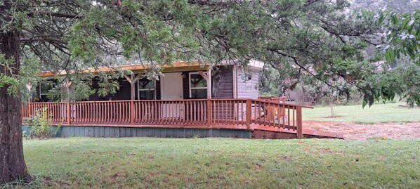 Updated, deck is now a covered porch and the shade is wonderful. 