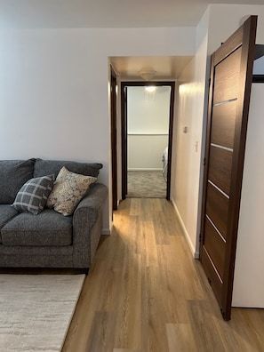 Hallway to bathroom and bedroom.