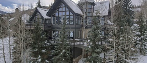 Experience the beauty of expansive porches and oversized windows.