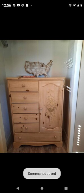 Armoire in queen bedroom 