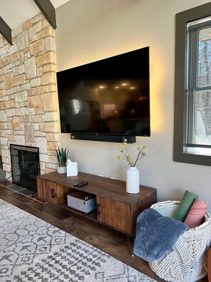 Large-screen TV with Roku, Klipsch soundbar and Bluetooth speaker are ready to bring music to your ears.