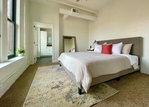 Mater bedroom with walk-in closet, king bed and private full bath