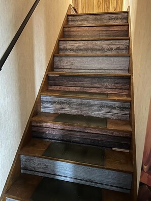 Stairway to the 252 sq ft private dormer room. 
