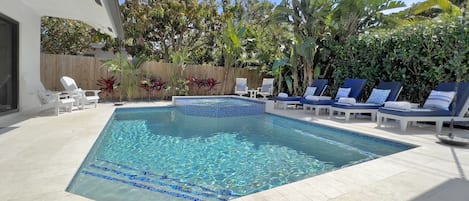 The heated pool offers a spa vanishing edge!