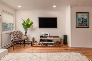 Smart TV and Magazines in the Living Room