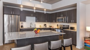 Unit may vary in layout, view, floor, and decor.