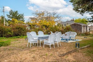 Outdoor dining next to fire pit 