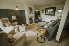 Ground floor: Cosy lounge with wood burning stove