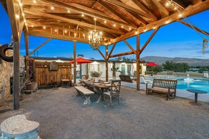 Enjoy a family dinner under the soft barn lights 