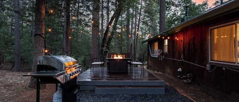 Sit around the firepit on the newly built deck and grill your favorite meals
