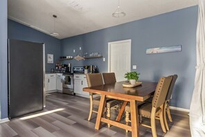 Enjoy meals in a spacious and inviting dining area,  sharing good food & fun.