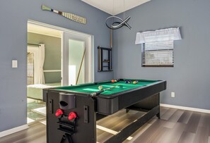 Triple the fun in Denudin:3-in-1 game room pool table, air hockey and ping-pong.