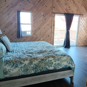 Master Bedroom, King bed, second floor balcony.