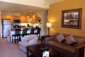 Living room with pull-out sofa (representative unit)