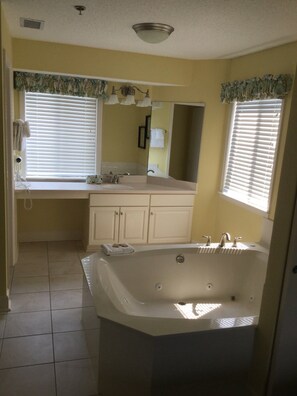 Master en suite with jetted tub, walk-in shower, separate toilet