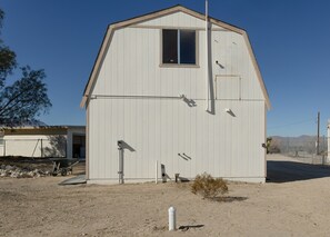 RV hook-up with power, water and sewer dump in the back yard.