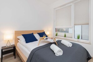 Bedroom with a double bed and wardrobe