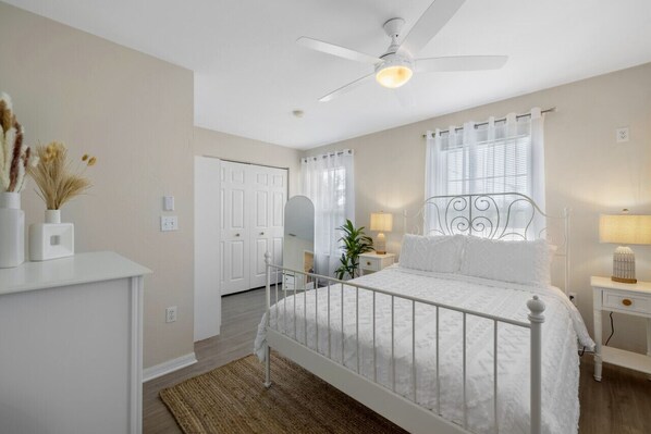 Queen bedroom with lots of natural light