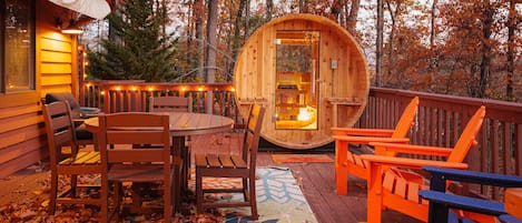 The upper deck!  Hot tub, barrel sauna and outdoor dining/seating!
