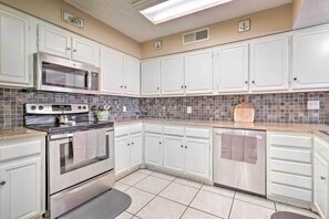 Kitchen | 1st-Floor Bedroom/Showers | Free WiFi | Towels/Linens