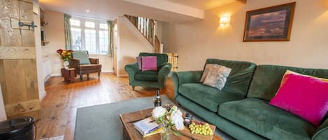 Ground floor: Double aspect sitting room with wood burning stove