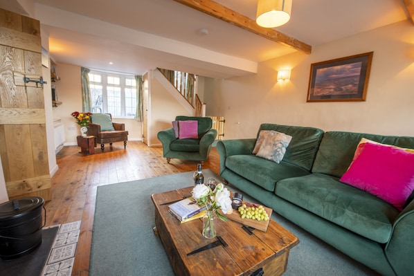 Ground floor: Double aspect sitting room with wood burning stove