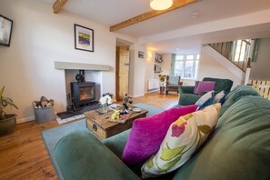 Ground floor: Comfortable seating for four guests in the cottage sitting room