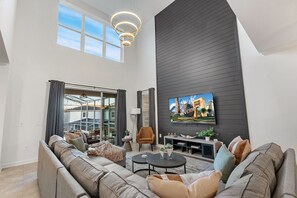 Grand Room with large TV and soundbar. 
