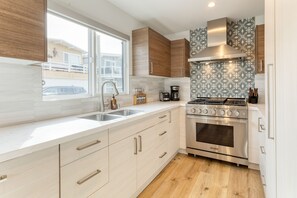 Kitchen with a gas range.