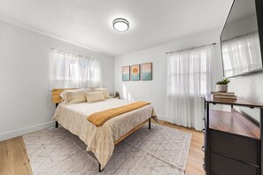 Guest room with Queen size bed and 55" Smart TV