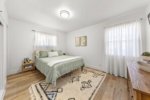 Primary Ensuite with Queen size bed and 55" Smart TV