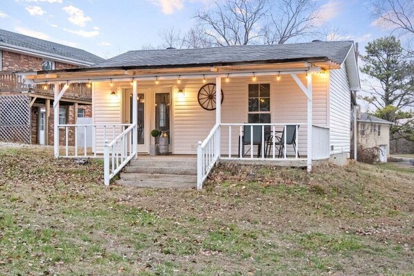 Exterior | Patio with Lit Porch and Seating