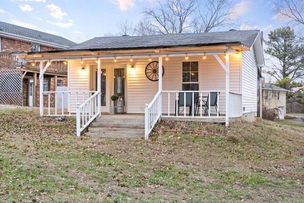 Exterior | Patio with Lit Porch and Seating