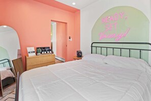 The queen bed comes topped in quality linen for your vacay!