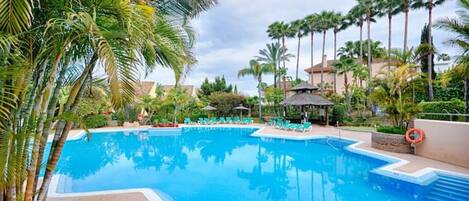 Main pool area set in beautiful tropical gardens 