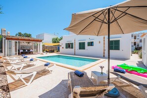 Pool and sunbeds
